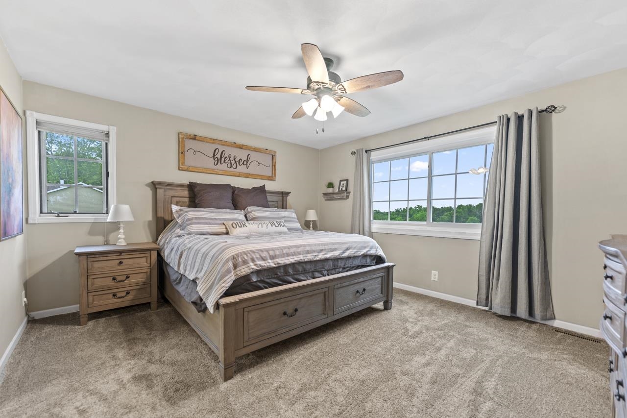 2108 Lake Summerset Road Lake Summerset, IL 61019 - Photo 21 of 53 a bedroom with a bed and a window