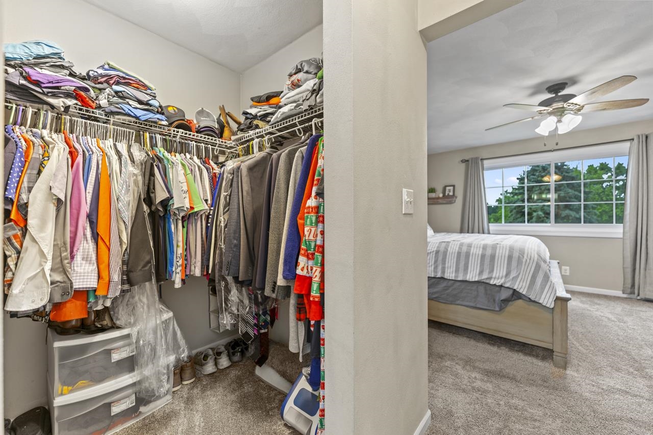 2108 Lake Summerset Road Lake Summerset, IL 61019 - Photo 23 of 53 a view of walk in closet with clothes and shoes