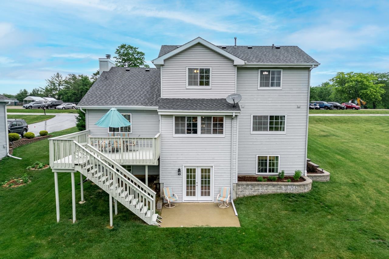 2108 Lake Summerset Road Lake Summerset, IL 61019 - Photo 41 of 53 a view of house with a yard and deck