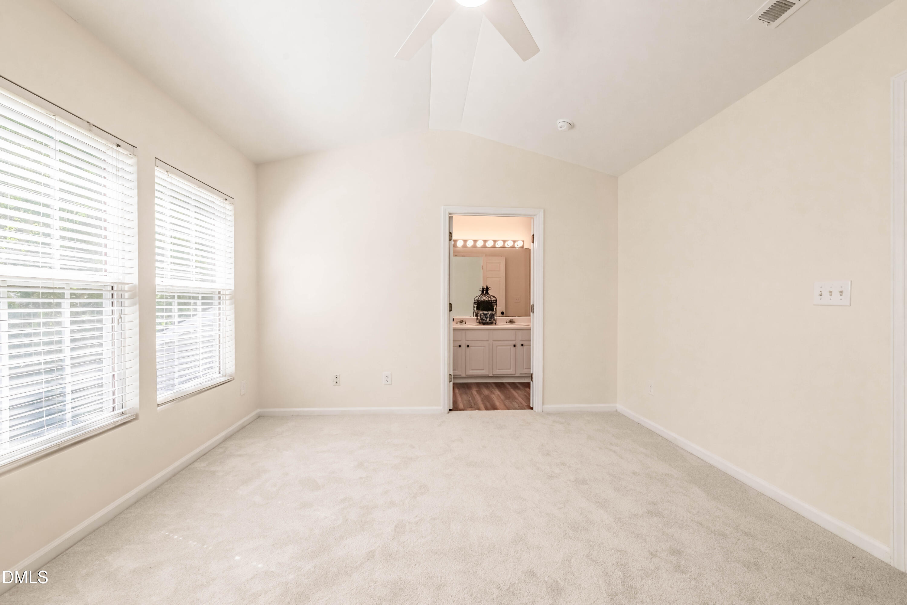 5209 Echo Ridge Road Raleigh, NC 27612 - Photo 11 of 16 a view of an empty room with a window