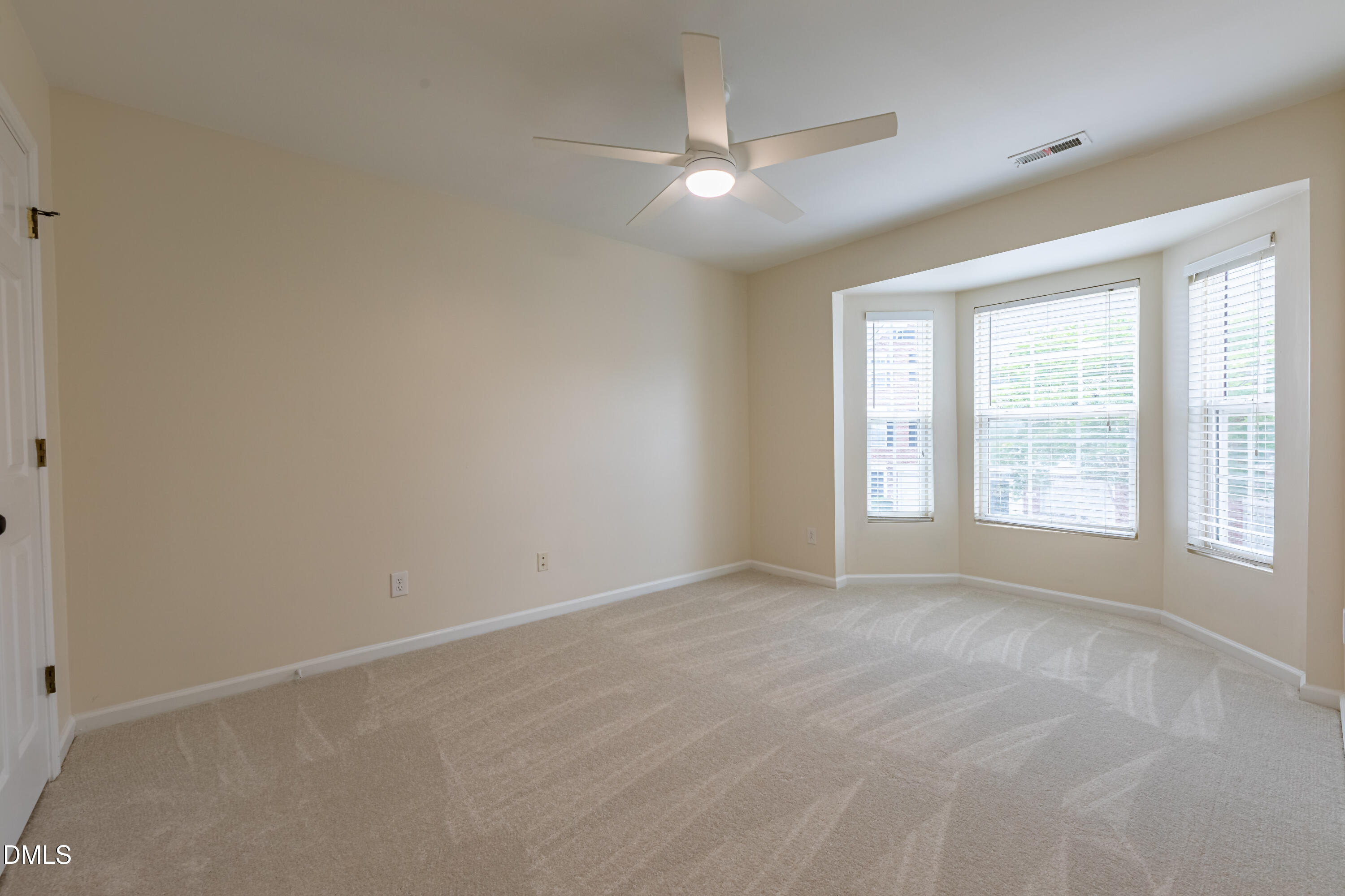 5209 Echo Ridge Road Raleigh, NC 27612 - Photo 14 of 16 a view of an empty room with a window