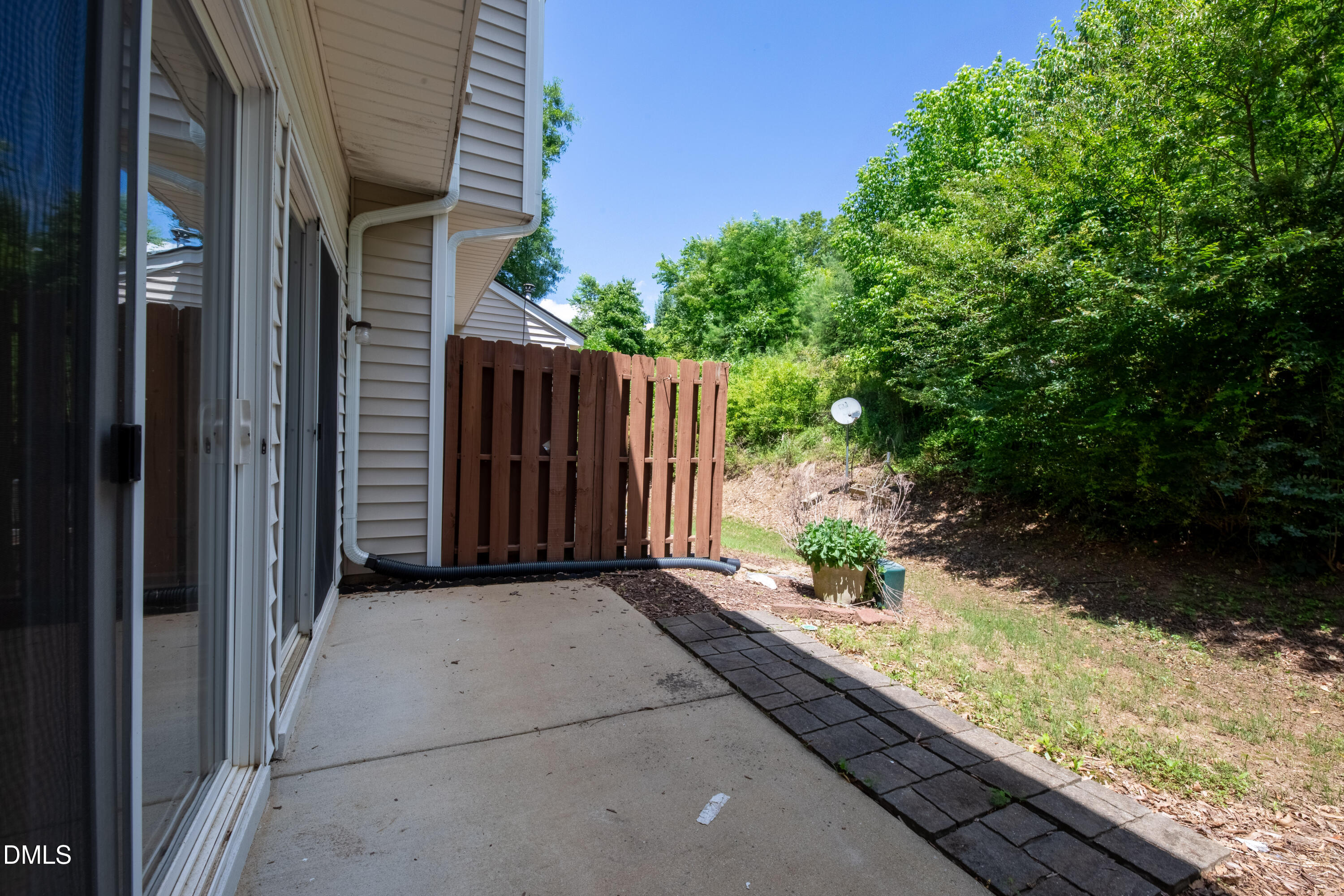 5209 Echo Ridge Road Raleigh, NC 27612 - Photo 16 of 16 a view of a backyard with pathway