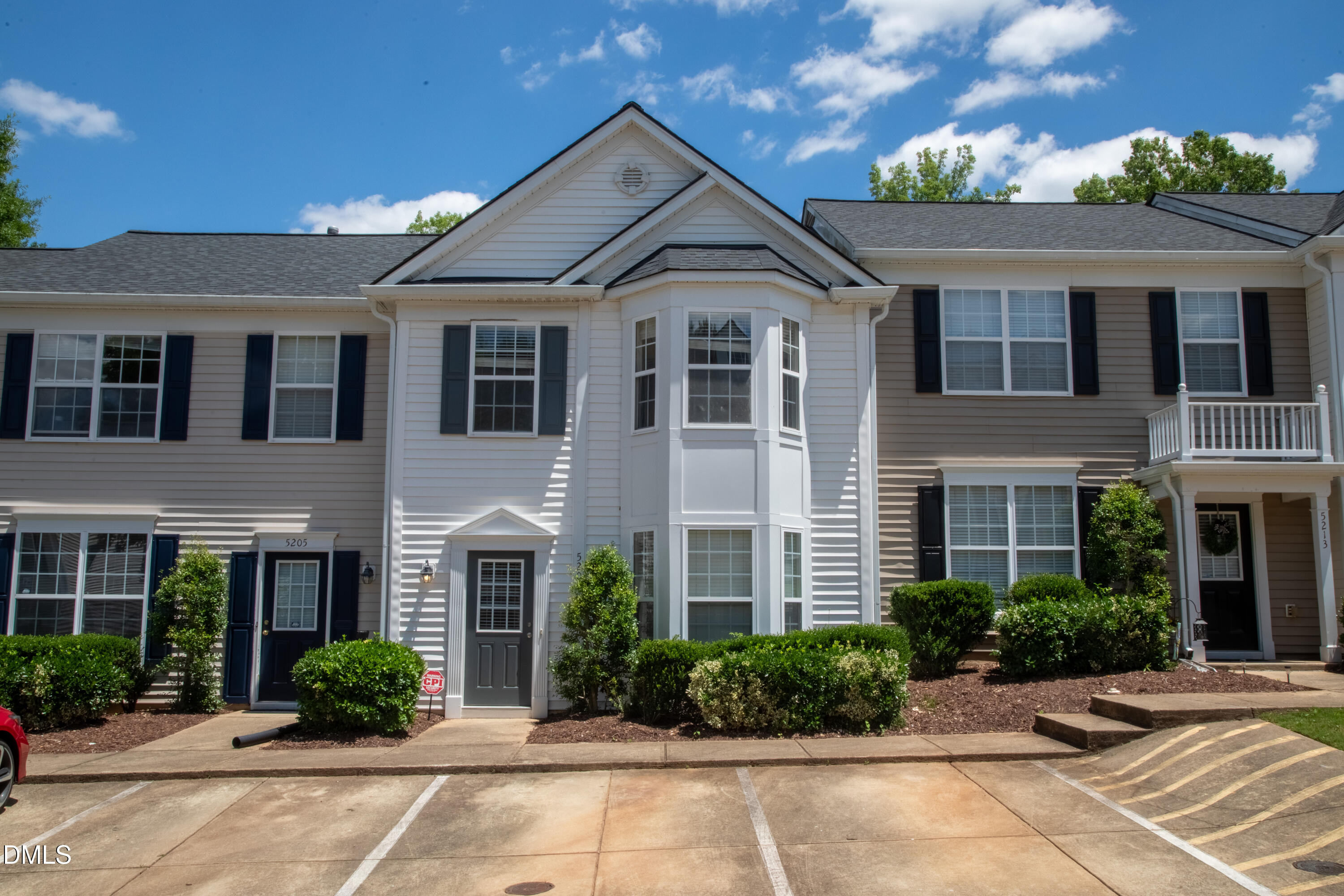 5209 Echo Ridge Road Raleigh, NC 27612 - Photo 2 of 16 a front view of a house with garden