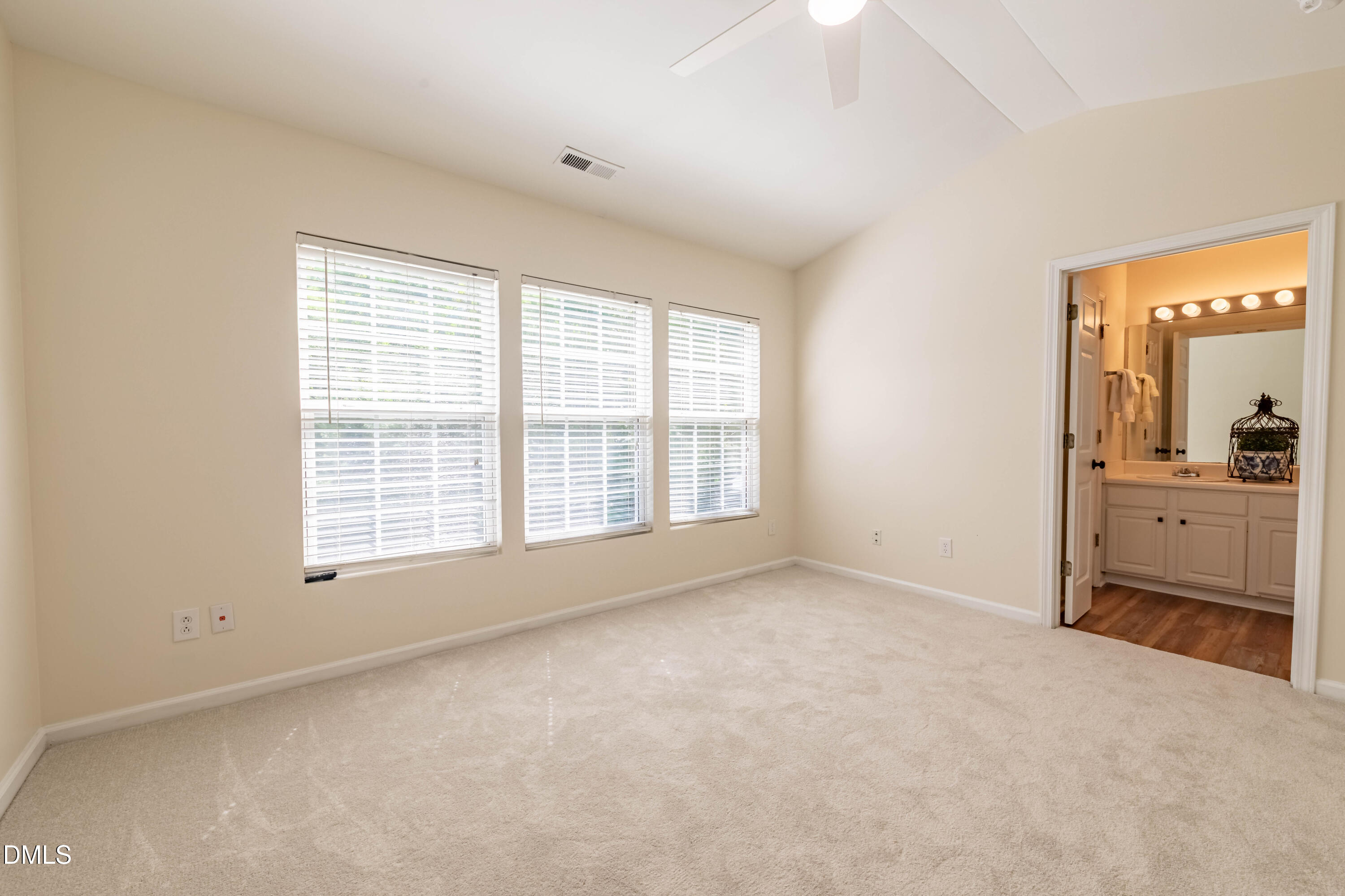 5209 Echo Ridge Road Raleigh, NC 27612 - Photo 10 of 16 a view of an empty room with a window