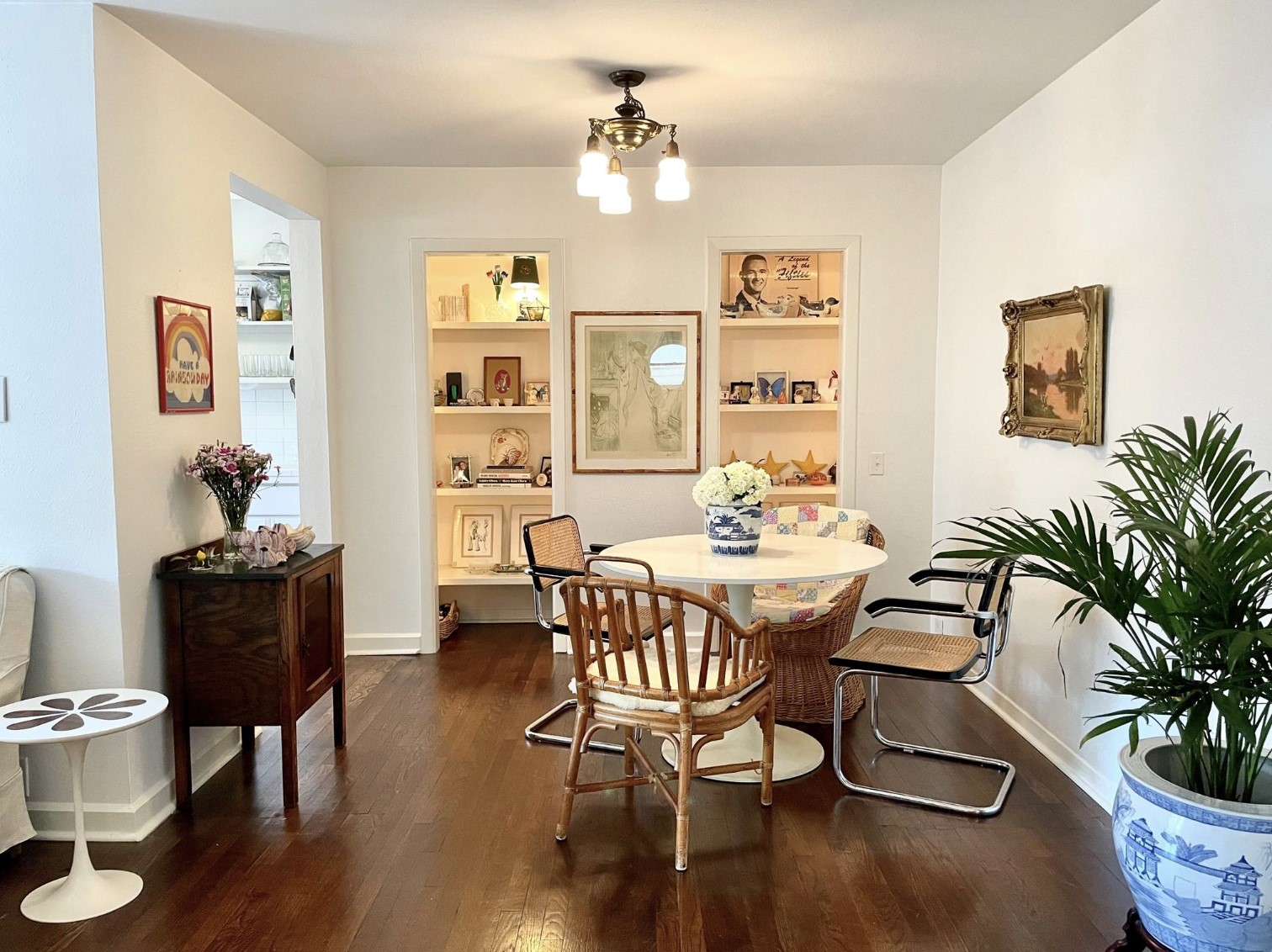 429 Hawthorne Street Houston, TX 77006 - Photo 19 of 35 a view of a livingroom and dining room with furniture wooden floor and a chandelier