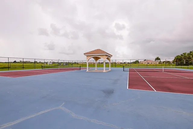 a view of swimming pool with an outdoor space and seating area