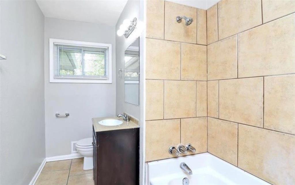 3711 Daisy Drive Decatur, GA 30032 - Photo 11 of 18 a bathroom with a sink and a tub