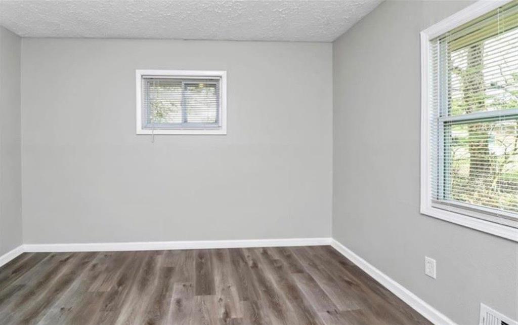 3711 Daisy Drive Decatur, GA 30032 - Photo 12 of 18 an empty room with a window
