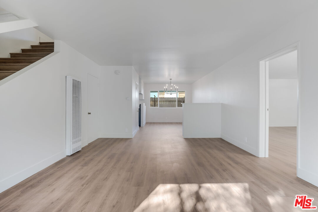 1813 9th Street, Unit 4 Santa Monica, CA 90404 - Photo 1 of 15 a view of empty room with wooden floor
