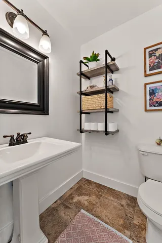 a bathroom with a bathtub and window