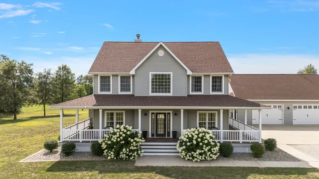 a view of a swimming pool with a yard