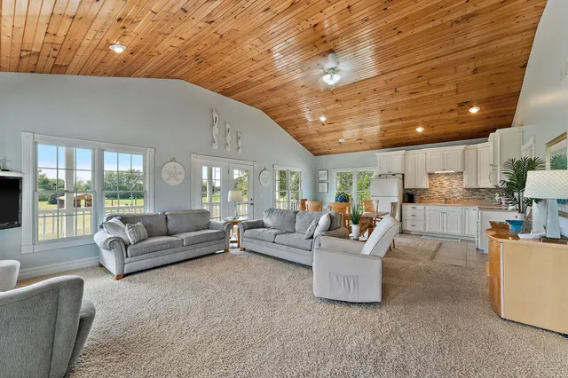 a view of a field with an ocean