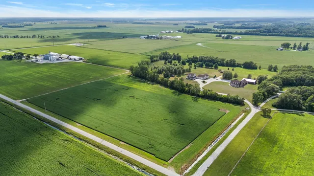 a view of a field with an outdoor space