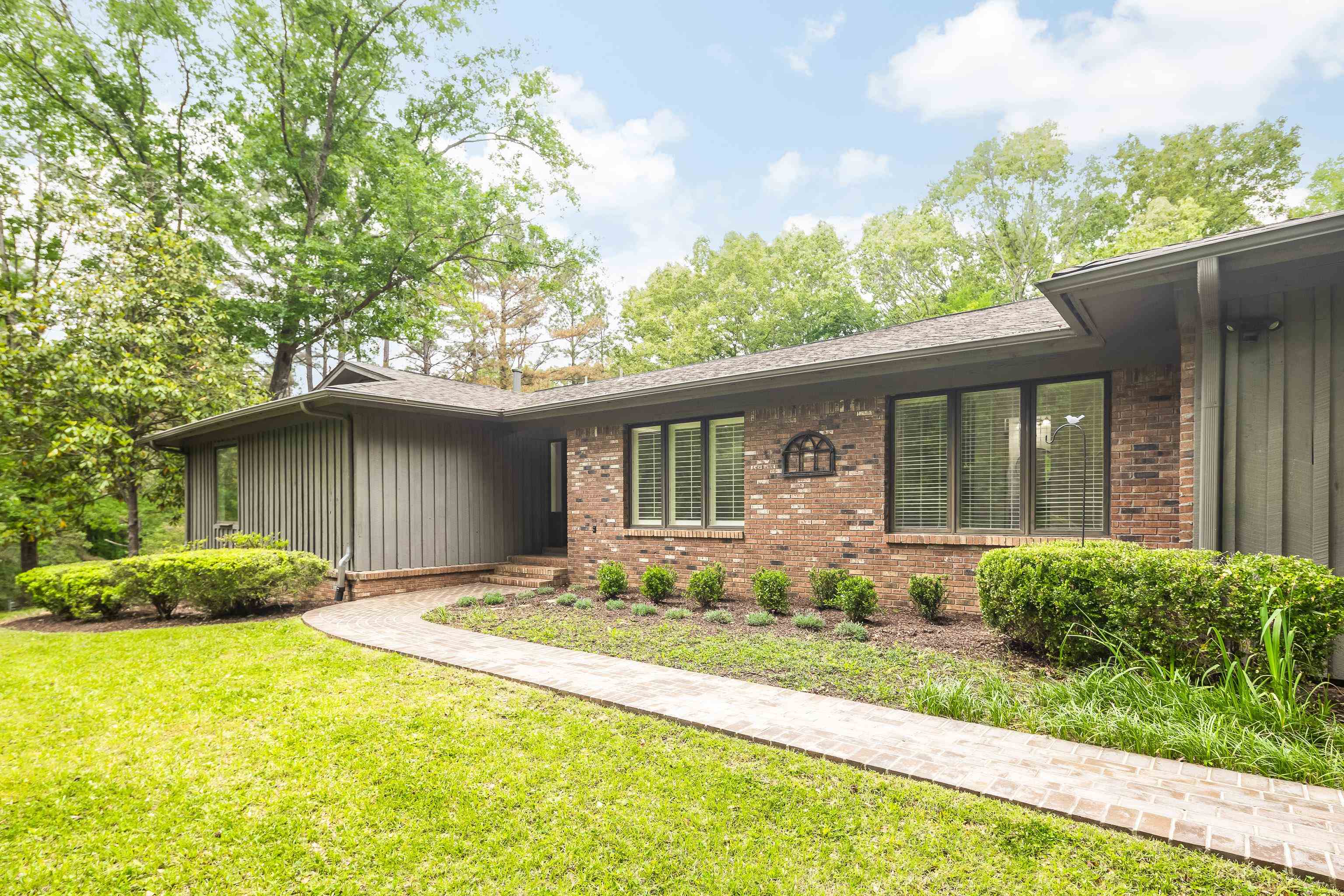 10470 Raleigh Lagrange Road East Eads, TN 38028 - Photo 1 of 40 a front view of a house with a garden and porch