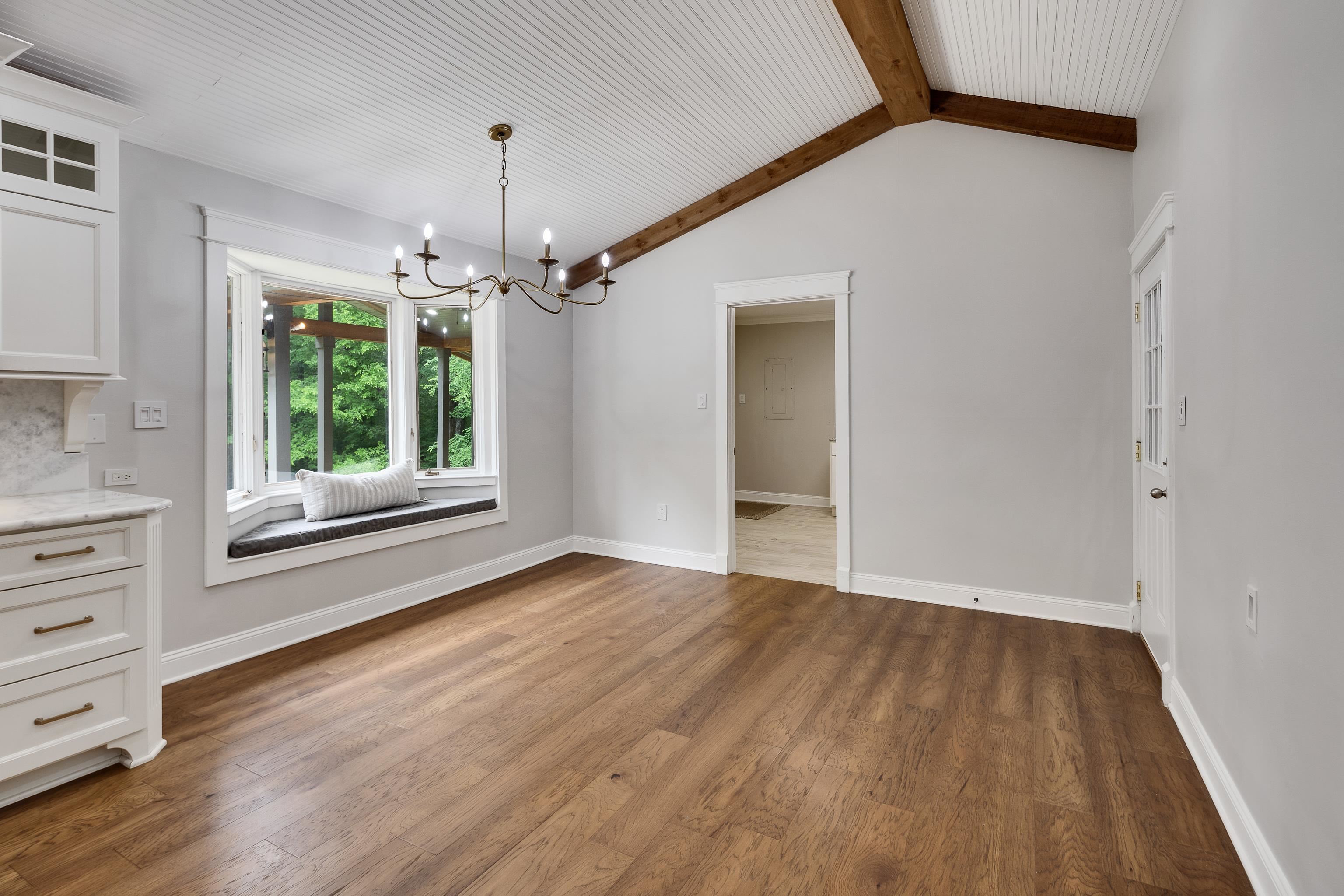 10470 Raleigh Lagrange Road East Eads, TN 38028 - Photo 14 of 40 wooden floor in an empty room with a window