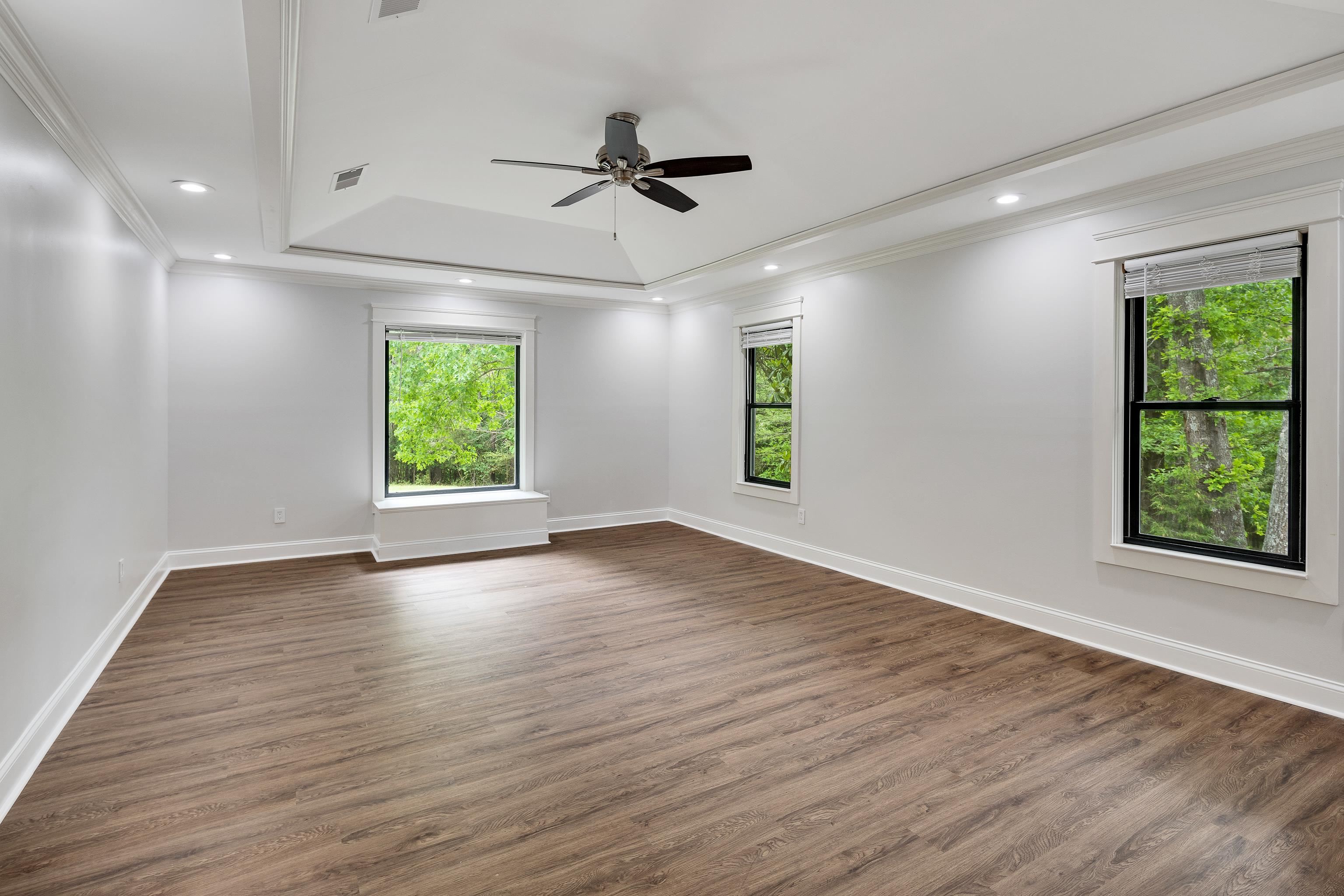 10470 Raleigh Lagrange Road East Eads, TN 38028 - Photo 19 of 40 a view of an empty room with a window and wooden floor