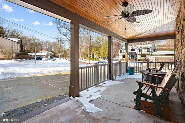 a view of a porch with wooden floor