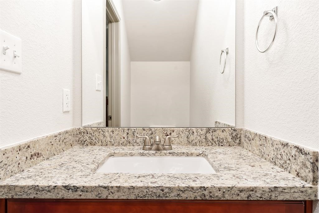 910 Shady Lane, Unit B Conroe, TX 77301 - Photo 4 of 18 a view of a bath tub