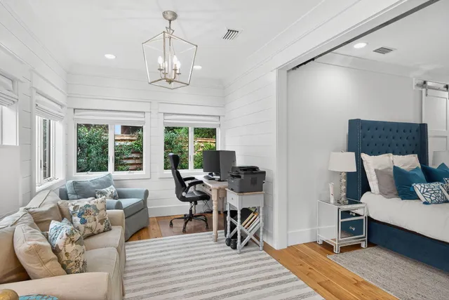 a work room with furniture and a fireplace