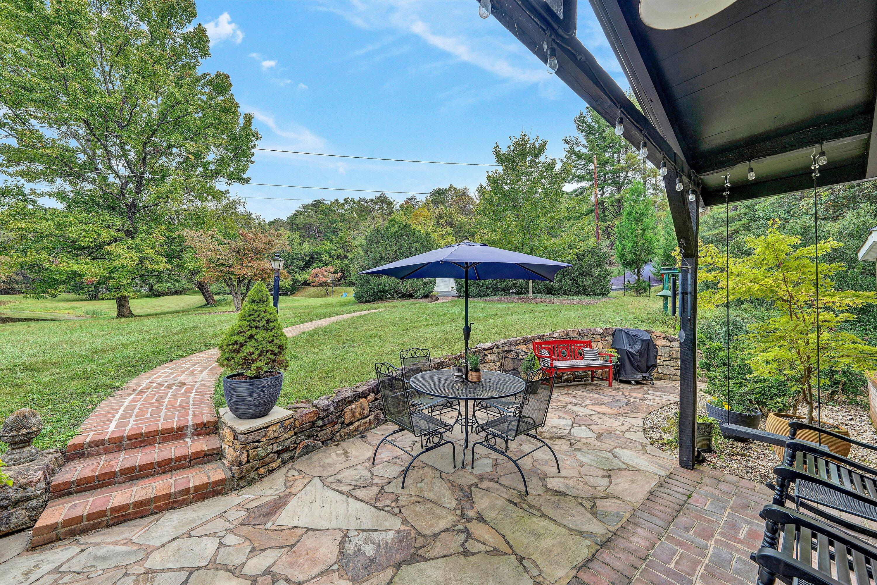 400 Walnut Road Salem, VA 24153 - Photo 12 of 97 a view of backyard with outdoor seating and green space
