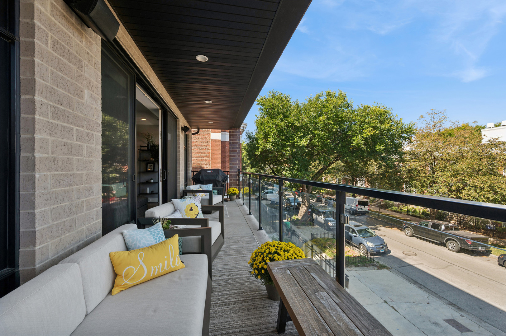 231 West Scott Street, Unit 2 Chicago, IL 60610 - Photo 11 of 33 a view of roof deck with couches and wooden floor