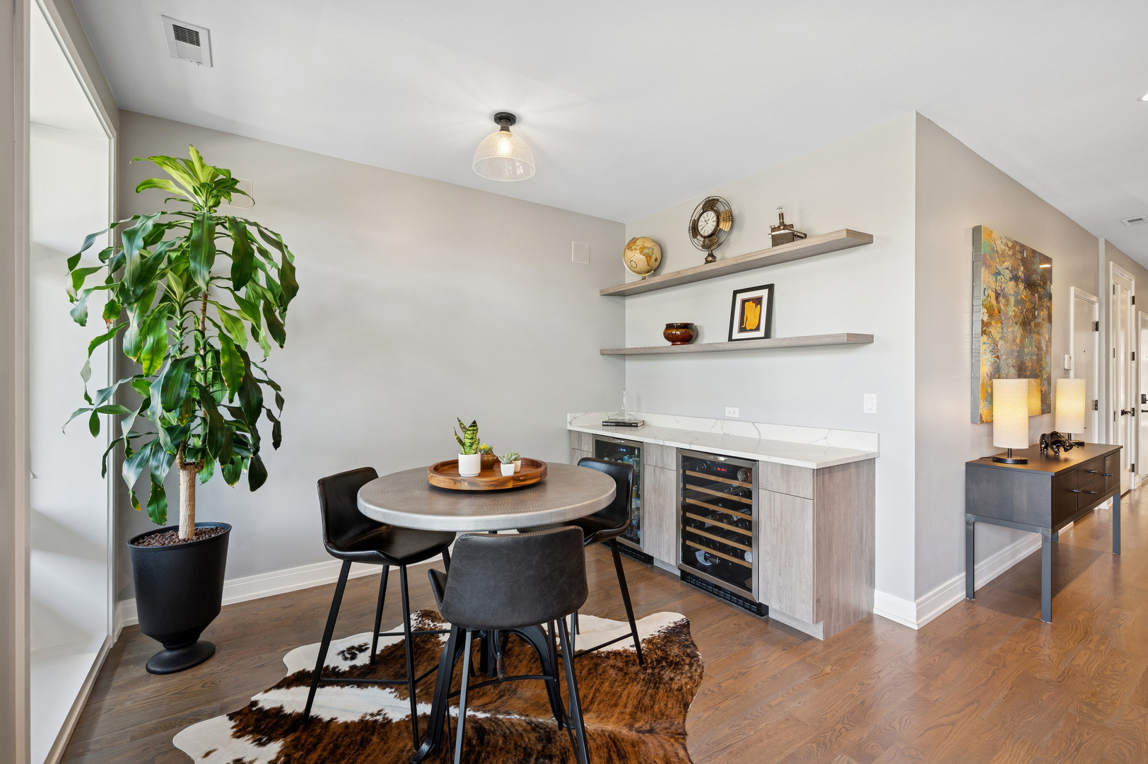 231 West Scott Street, Unit 2 Chicago, IL 60610 - Photo 13 of 33 a view of a dining room with furniture and wooden floor
