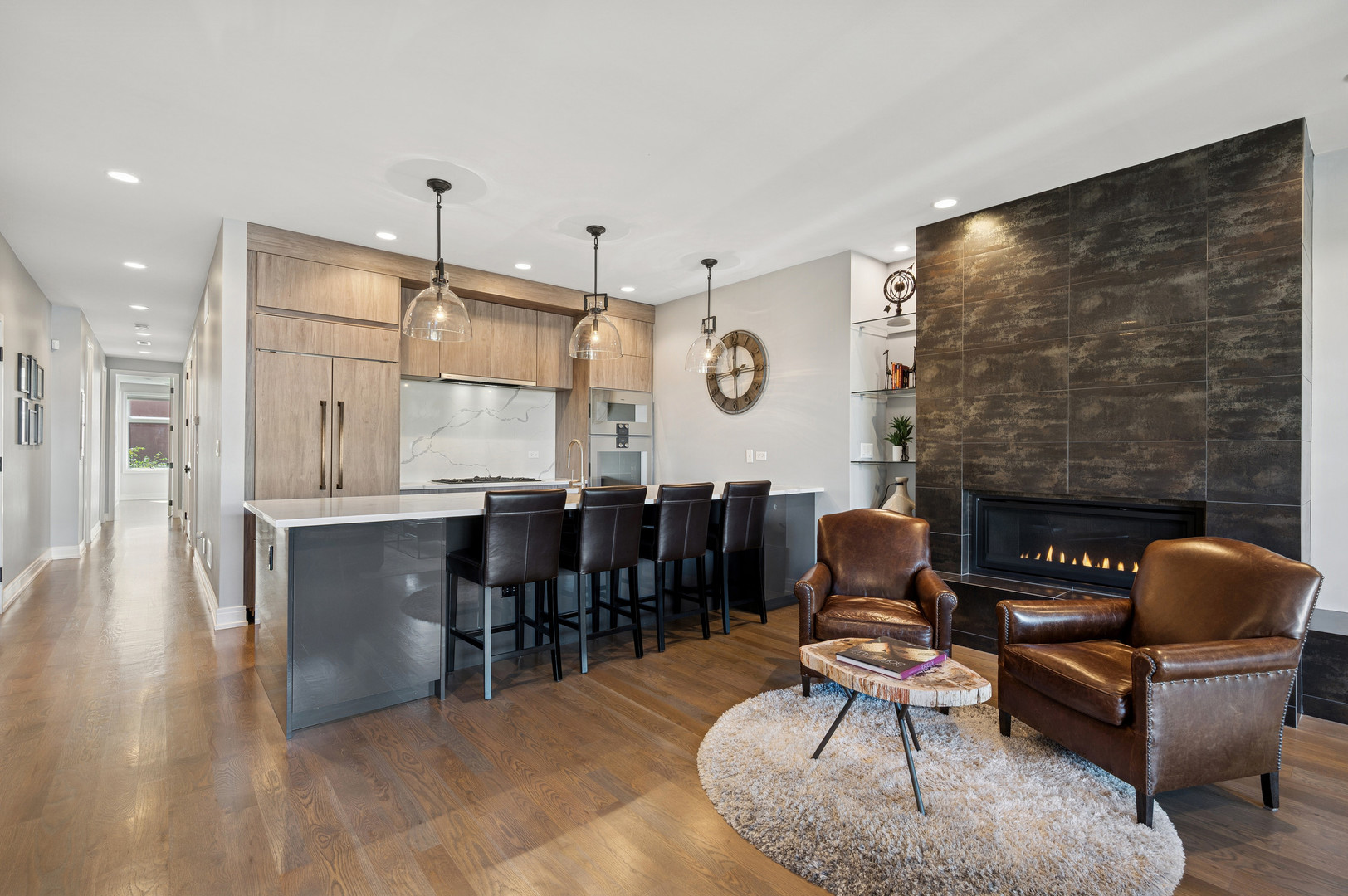 231 West Scott Street, Unit 2 Chicago, IL 60610 - Photo 6 of 33 a living room with fireplace furniture and a wooden floor