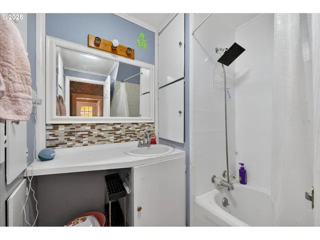 a children room with toys and a ceiling fan