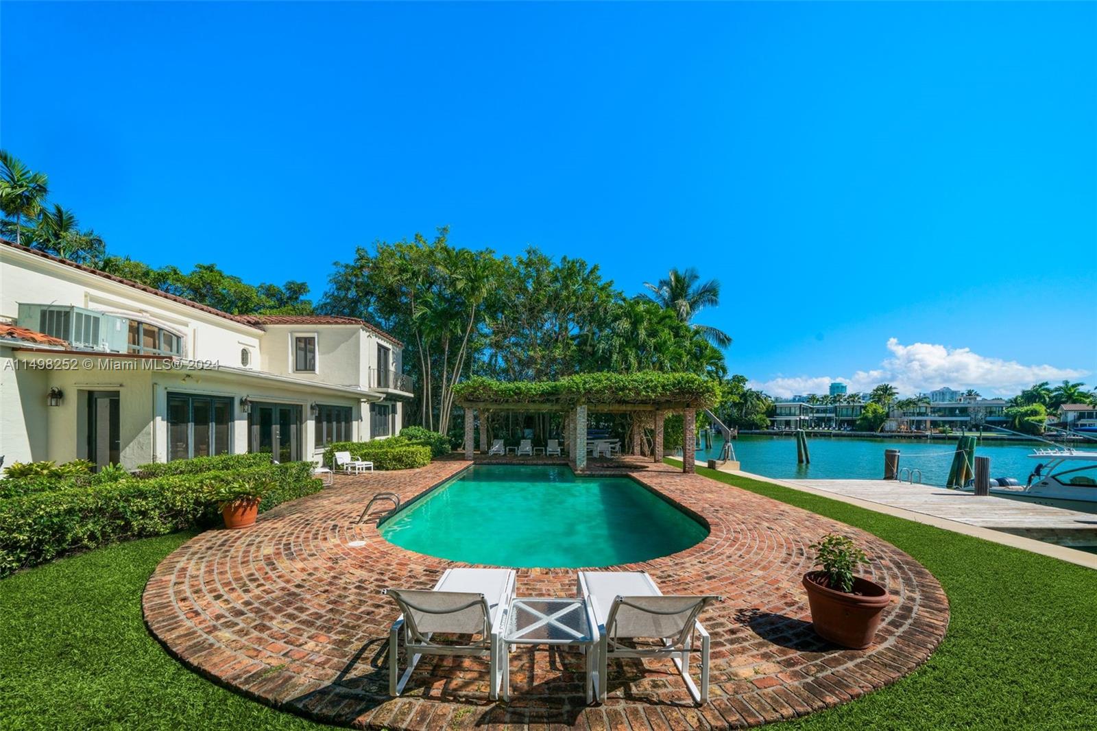 12 Lagorce Circle Miami Beach, FL 33141 - Photo 11 of 23 an outdoor space with furniture and garden