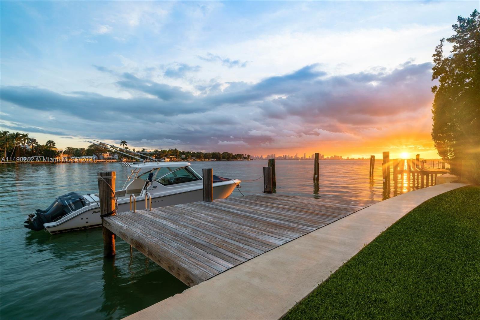 12 Lagorce Circle Miami Beach, FL 33141 - Photo 12 of 23 a view of a lake with outdoor seating