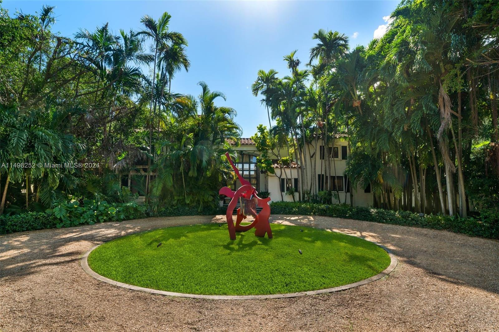 12 Lagorce Circle Miami Beach, FL 33141 - Photo 14 of 23 a view of a park with large trees
