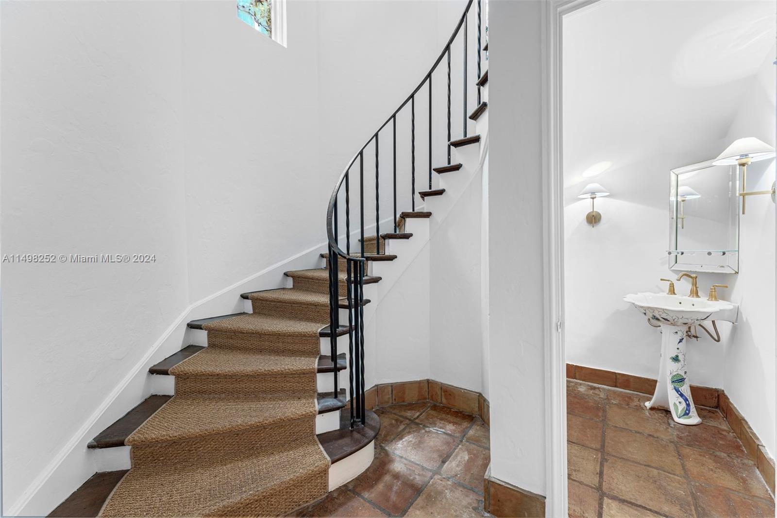 12 Lagorce Circle Miami Beach, FL 33141 - Photo 21 of 23 a view of entryway and hall with wooden floor