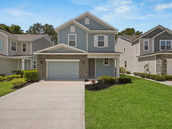 front view of a house with a yard