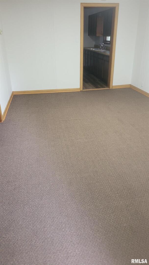 211 West Bryan Street Herrin, IL 62948 - Photo 13 of 14 a view of an empty room and a bathroom