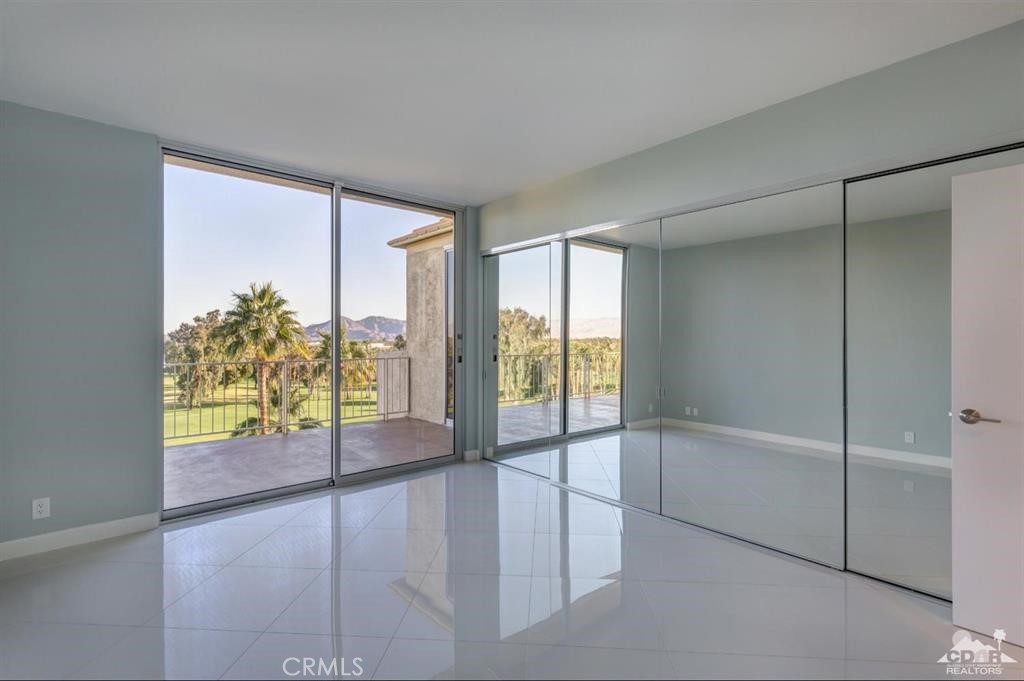 900 Island Drive, Unit 705 Rancho Mirage, CA 92270 - Photo 17 of 25 a view of an empty room and window