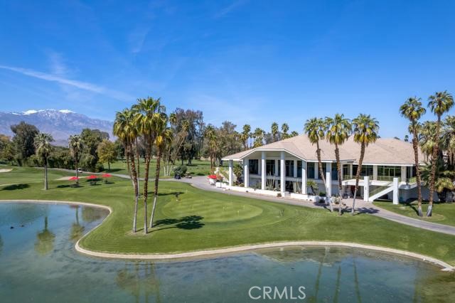 900 Island Drive, Unit 705 Rancho Mirage, CA 92270 - Photo 22 of 25 a view of a house with a big yard