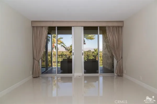 wooden floor and window in an empty room