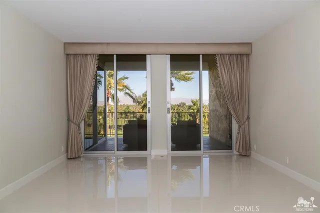wooden floor and window in an empty room