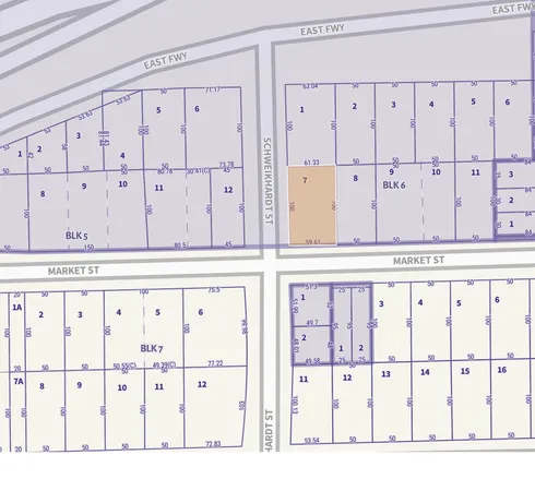 a black white and white photo of a building