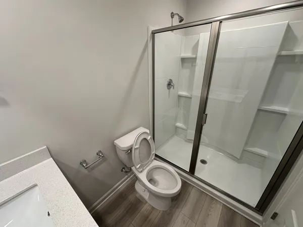 a bathroom with a sink and a shower