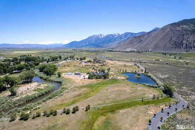 a view of a city with mountains in the background