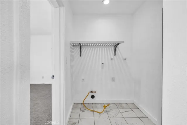 a view of a backyard of the house