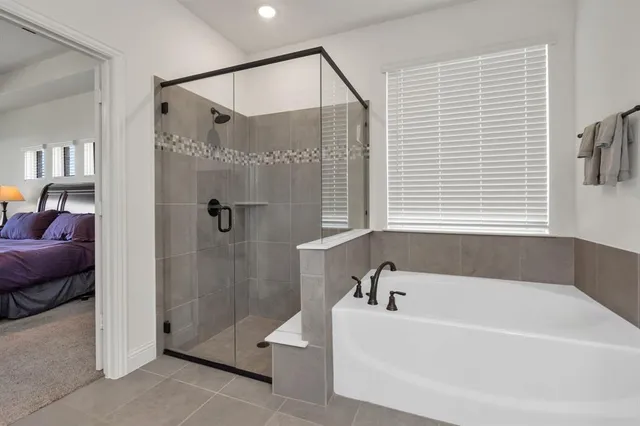 a bathroom with a sink double vanity and a mirror