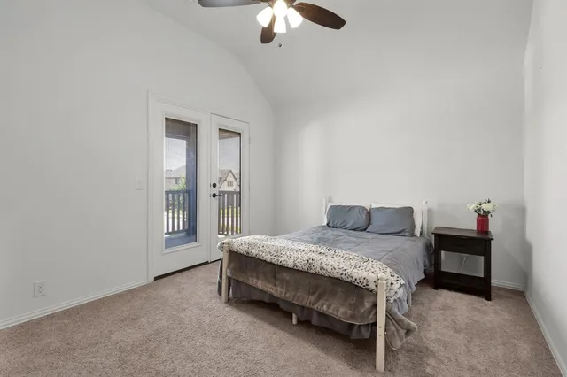 a bathroom with a granite countertop sink toilet and a mirror