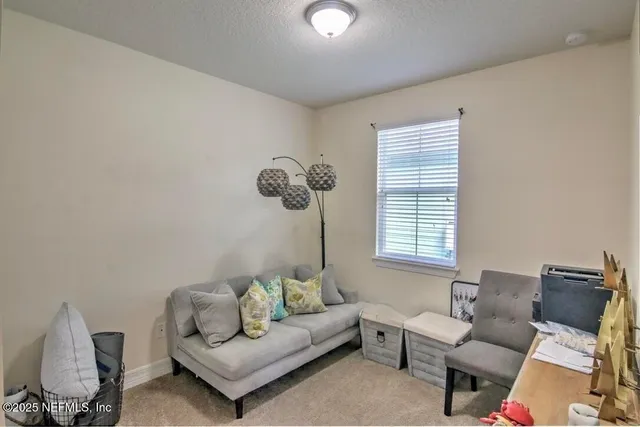 a bathroom with a tub toilet and a sink