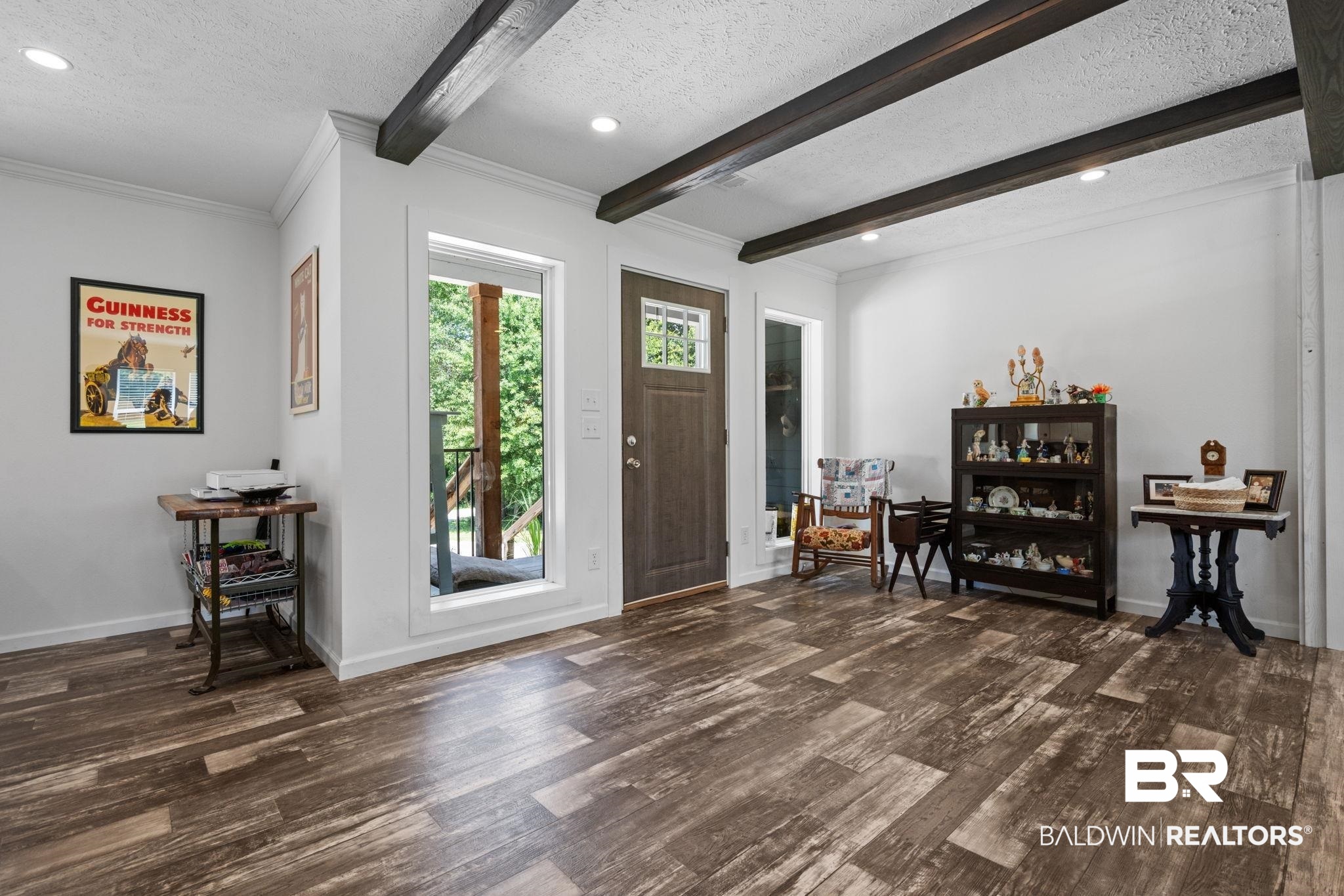 10703 South Ridge Drive Semmes, AL 36575 - Photo 12 of 37 Foyer with a textured ceiling, dark wood-type flooring, beamed ceiling, recessed lighting, and ornamental molding