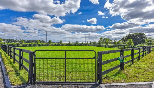 a view of swimming pool from a balcony