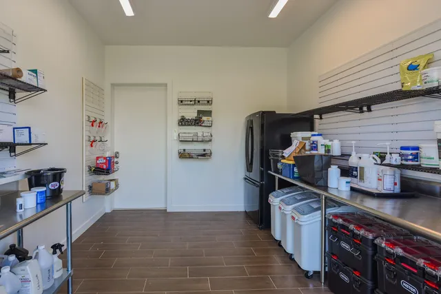 a kitchen with stainless steel appliances granite countertop a sink and cabinets
