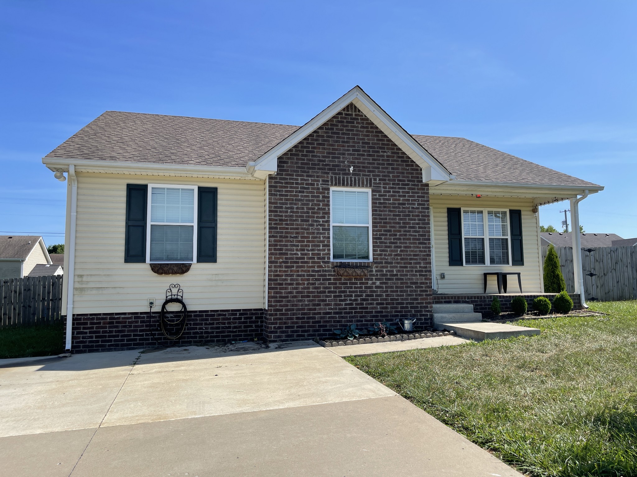 224 Shaub Road Portland, TN 37148 - Photo 1 of 23 a front view of a house with a yard