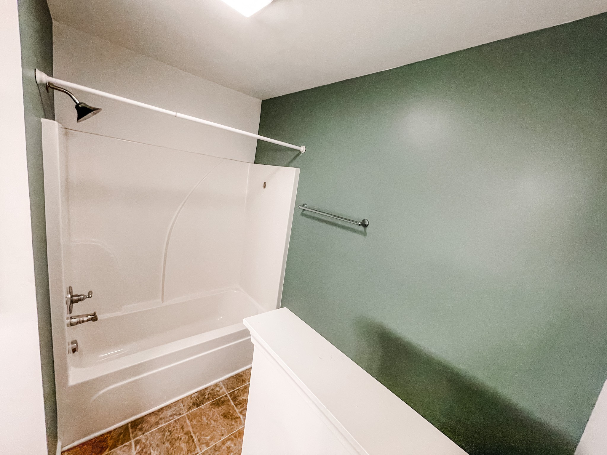 224 Shaub Road Portland, TN 37148 - Photo 15 of 23 a bathroom with a bathtub and a shower